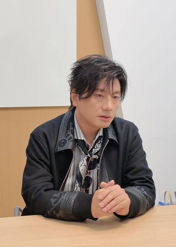 海来阿木接受采访 雷蕴含 摄